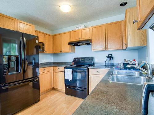 B-1639 Bowen Rd, Nanaimo, BC - Indoor Photo Showing Kitchen With Double Sink