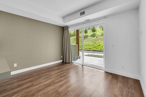 210-975 Academy Way, Kelowna, BC - Indoor Photo Showing Other Room