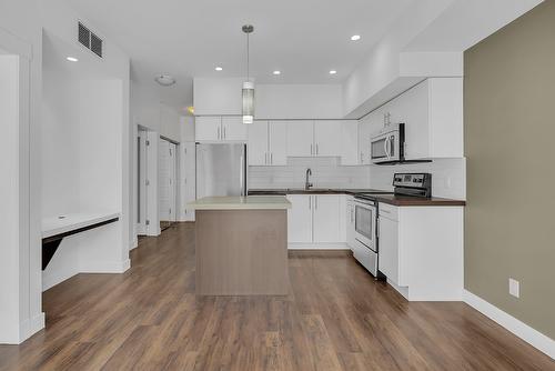 210-975 Academy Way, Kelowna, BC - Indoor Photo Showing Kitchen With Upgraded Kitchen