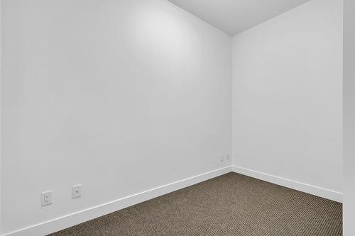 210-975 Academy Way, Kelowna, BC - Indoor Photo Showing Other Room