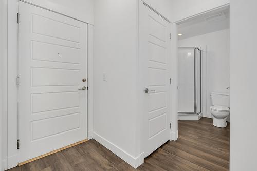 210-975 Academy Way, Kelowna, BC - Indoor Photo Showing Other Room