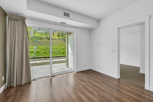 210-975 Academy Way, Kelowna, BC - Indoor Photo Showing Other Room