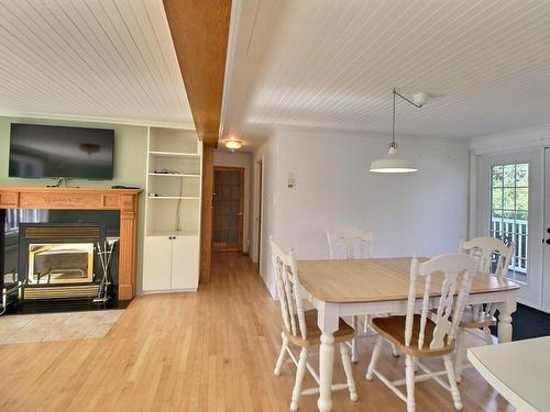 Vue d'ensemble - 4470 Ch. Lemerise, Amos, QC - Indoor Photo Showing Dining Room With Fireplace