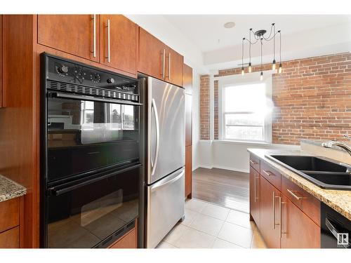 #511 10728 82 Av Nw, Edmonton, AB - Indoor Photo Showing Kitchen With Double Sink