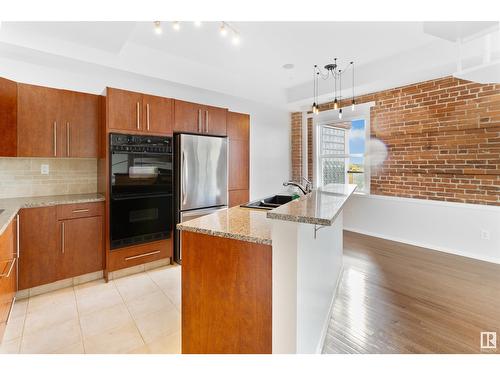 #511 10728 82 Av Nw, Edmonton, AB - Indoor Photo Showing Kitchen With Double Sink