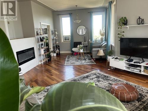 13335 Trail Way, Dawson Creek, BC - Indoor Photo Showing Living Room With Fireplace