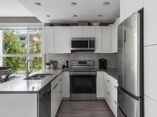 205-1460 Pandora Ave, Victoria, BC - Indoor Photo Showing Kitchen With Stainless Steel Kitchen With Double Sink With Upgraded Kitchen