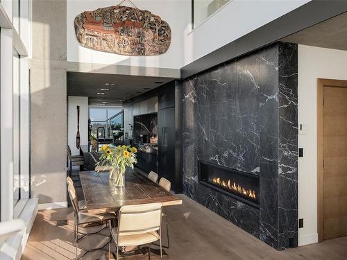 1702-989 Johnson St, Victoria, BC - Indoor Photo Showing Dining Room With Fireplace