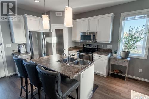 1309 Kingbird Road, Regina, SK - Indoor Photo Showing Kitchen With Double Sink