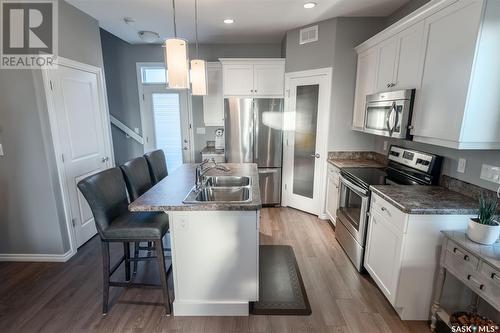 1309 Kingbird Road, Regina, SK - Indoor Photo Showing Kitchen With Double Sink With Upgraded Kitchen