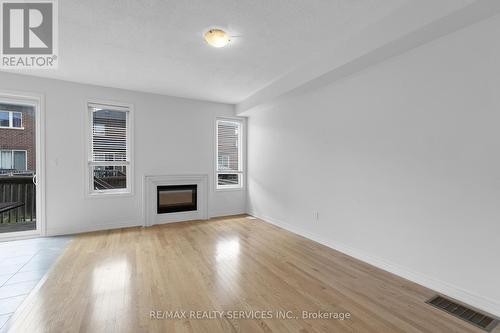 19 Sky Harbour Drive, Brampton, ON - Indoor Photo Showing Living Room With Fireplace