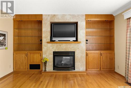 75 Krivel Crescent, Regina, SK - Indoor Photo Showing Living Room With Fireplace