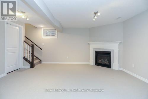 23 - 234 Peach Tree Boulevard, St. Thomas, ON - Indoor With Fireplace