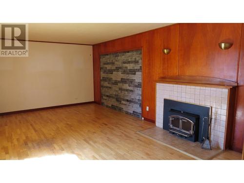 655 Kinchant Street, Quesnel, BC - Indoor Photo Showing Living Room With Fireplace