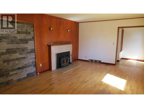 655 Kinchant Street, Quesnel, BC - Indoor Photo Showing Living Room With Fireplace