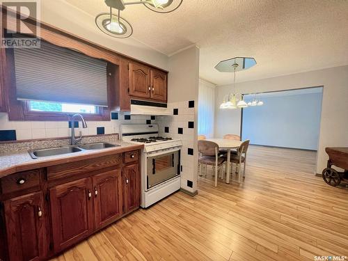 405 Churchill Street, Hudson Bay, SK - Indoor Photo Showing Kitchen With Double Sink