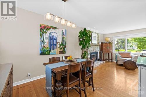 11 Stillwater Drive, Ottawa, ON - Indoor Photo Showing Dining Room With Fireplace