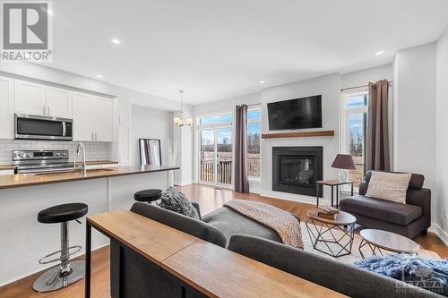 653 Putney Crescent, Ottawa, ON - Indoor Photo Showing Living Room With Fireplace