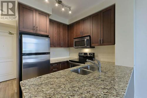 302 - 9245 Jane Street, Vaughan, ON - Indoor Photo Showing Kitchen With Double Sink