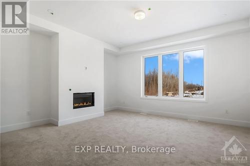 202 Douglas Hardie Street, Leeds And Grenville, ON - Indoor With Fireplace