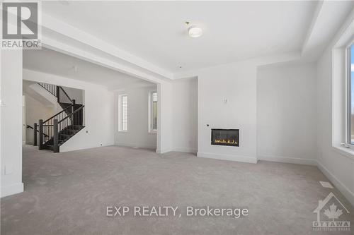 202 Douglas Hardie Street, Leeds And Grenville, ON - Indoor Photo Showing Other Room With Fireplace