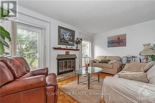 186 Du Grand Bois Avenue, Ottawa, ON - Indoor Photo Showing Living Room With Fireplace