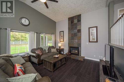 9265 Hartman Road, Prince George, BC - Indoor Photo Showing Living Room With Fireplace