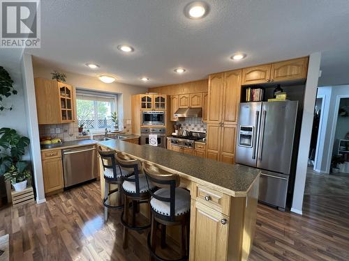 5615 Angus Court, Fort Nelson, BC - Indoor Photo Showing Kitchen With Double Sink