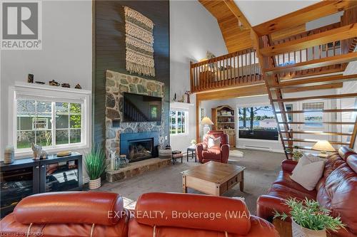 850 Pike Bay Road, Northern Bruce Peninsula, ON - Indoor Photo Showing Living Room With Fireplace