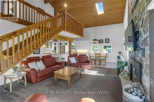 850 Pike Bay Road, Northern Bruce Peninsula, ON - Indoor Photo Showing Living Room With Fireplace