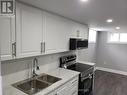 Lower - 635 Bloor Street E, Oshawa, ON  - Indoor Photo Showing Kitchen With Double Sink 