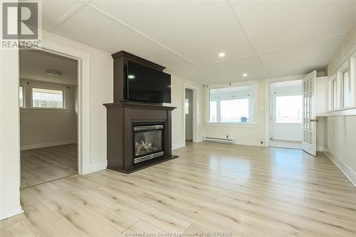 8266 Riverside Drive East, Windsor, ON - Indoor Photo Showing Other Room With Fireplace