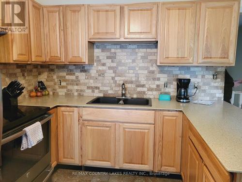 61 Seventh Street, Brock, ON - Indoor Photo Showing Kitchen With Double Sink