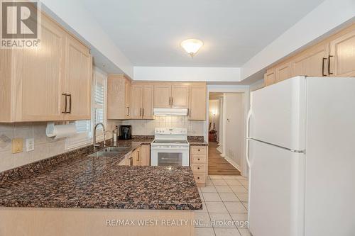 75 Fountainbridge Drive, Caledon, ON - Indoor Photo Showing Kitchen With Double Sink