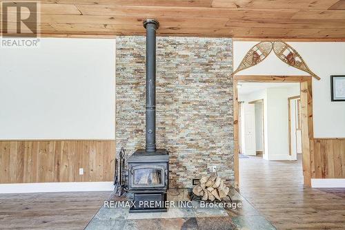 1153 Riding Ranch Road, South River, ON - Indoor With Fireplace