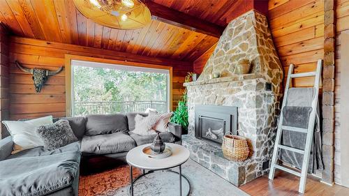 4613 41St Street, Osoyoos, BC - Indoor Photo Showing Living Room With Fireplace