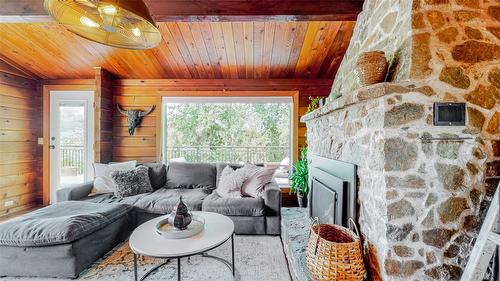 4613 41St Street, Osoyoos, BC - Indoor Photo Showing Living Room With Fireplace