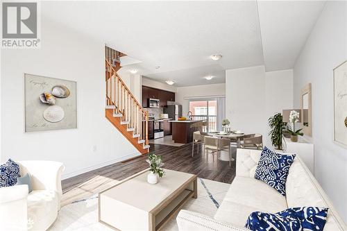 virtually stagged - 17 Dunes Drive Drive, Wasaga Beach, ON - Indoor Photo Showing Living Room