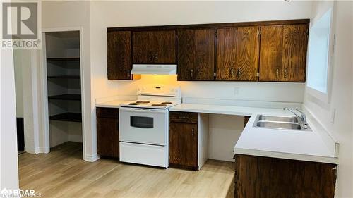 156 Simcoe Street Street, Sturgeon Falls, ON - Indoor Photo Showing Kitchen With Double Sink