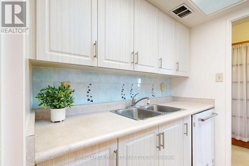 510 - 1535 Lakeshore Road E, Mississauga, ON - Indoor Photo Showing Kitchen With Double Sink