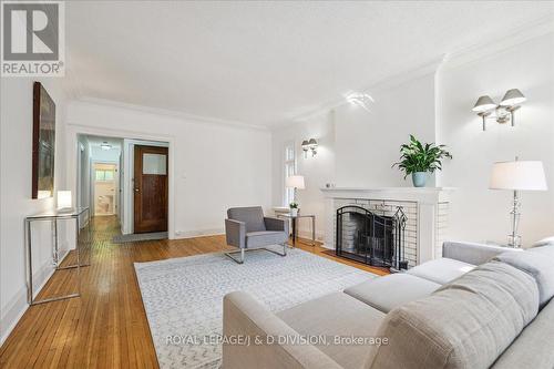 338 St Clair Avenue E, Toronto, ON - Indoor Photo Showing Living Room With Fireplace