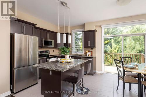 14 - 4165 Upper Middle Road, Burlington, ON - Indoor Photo Showing Kitchen With Stainless Steel Kitchen With Upgraded Kitchen