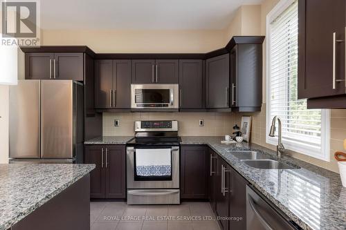 14 - 4165 Upper Middle Road, Burlington, ON - Indoor Photo Showing Kitchen With Stainless Steel Kitchen With Double Sink