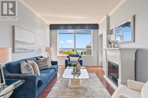 2514 - 100 Burloak Drive, Burlington, ON - Indoor Photo Showing Living Room With Fireplace