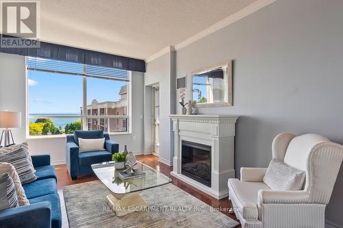 2514 - 100 Burloak Drive, Burlington, ON - Indoor Photo Showing Living Room With Fireplace