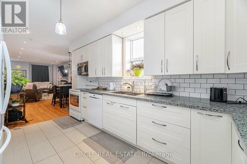 31 Wentworth Street N, Hamilton, ON - Indoor Photo Showing Kitchen With Double Sink