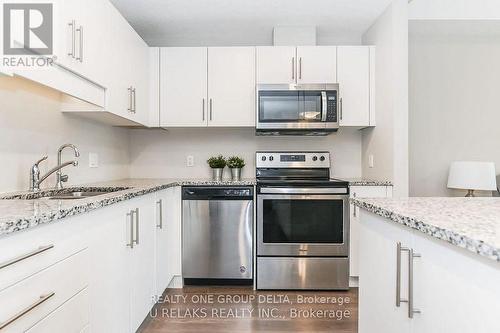 203 - 333 Gosling Gardens, Guelph, ON - Indoor Photo Showing Kitchen With Upgraded Kitchen