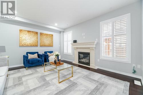 16 Burgess Crescent, Brantford, ON - Indoor Photo Showing Living Room With Fireplace