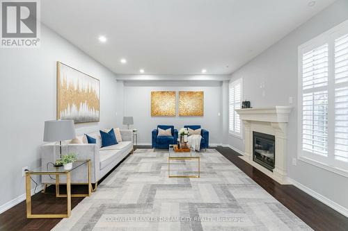 16 Burgess Crescent, Brantford, ON - Indoor Photo Showing Living Room With Fireplace