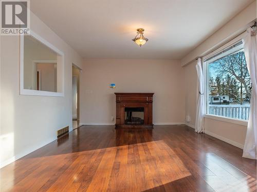 2013 Willowview Drive, Dawson Creek, BC - Indoor Photo Showing Living Room With Fireplace